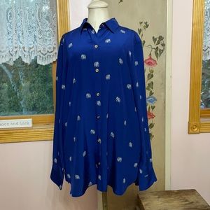 This blouse is 100% silk it is an XL new with tags never worn